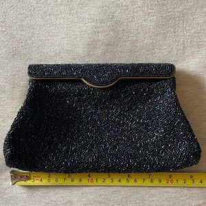 Vintage navy blue hand beaded clutch with satin lining and hinge closure